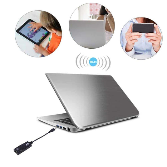 Image of USB-C ethernet adapter being used to add an ethernet port to a laptop, tablet or mobile phone
