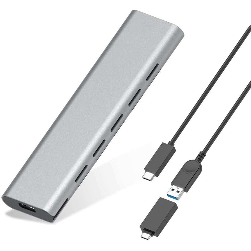 Load image into Gallery viewer, Silver SSD hard drive enclosure with 5 usb ports along the side. The image also has a usb cable and usb-c adapter
