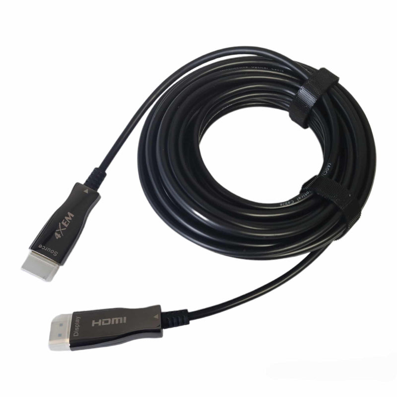 Load image into Gallery viewer, Fiber hdmi male to male cable rolled up with protectors covering the gold plated connectors against a white background
