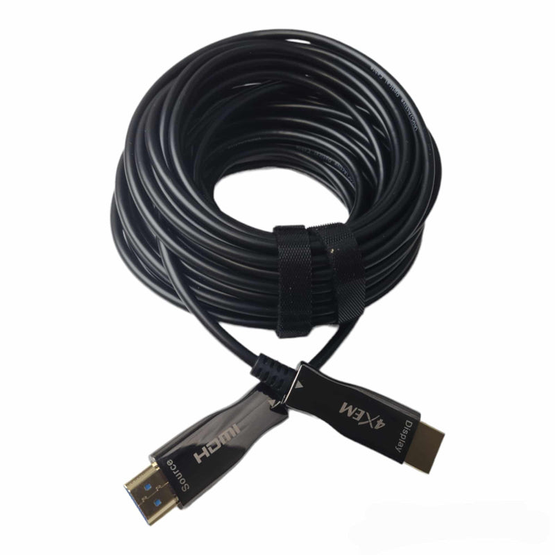 Load image into Gallery viewer, Fiber hdmi cable coiled onto it self against a white background
